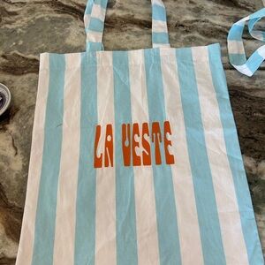 BNWOT La Veste Aqua and White Striped Tote Bag (has stain).